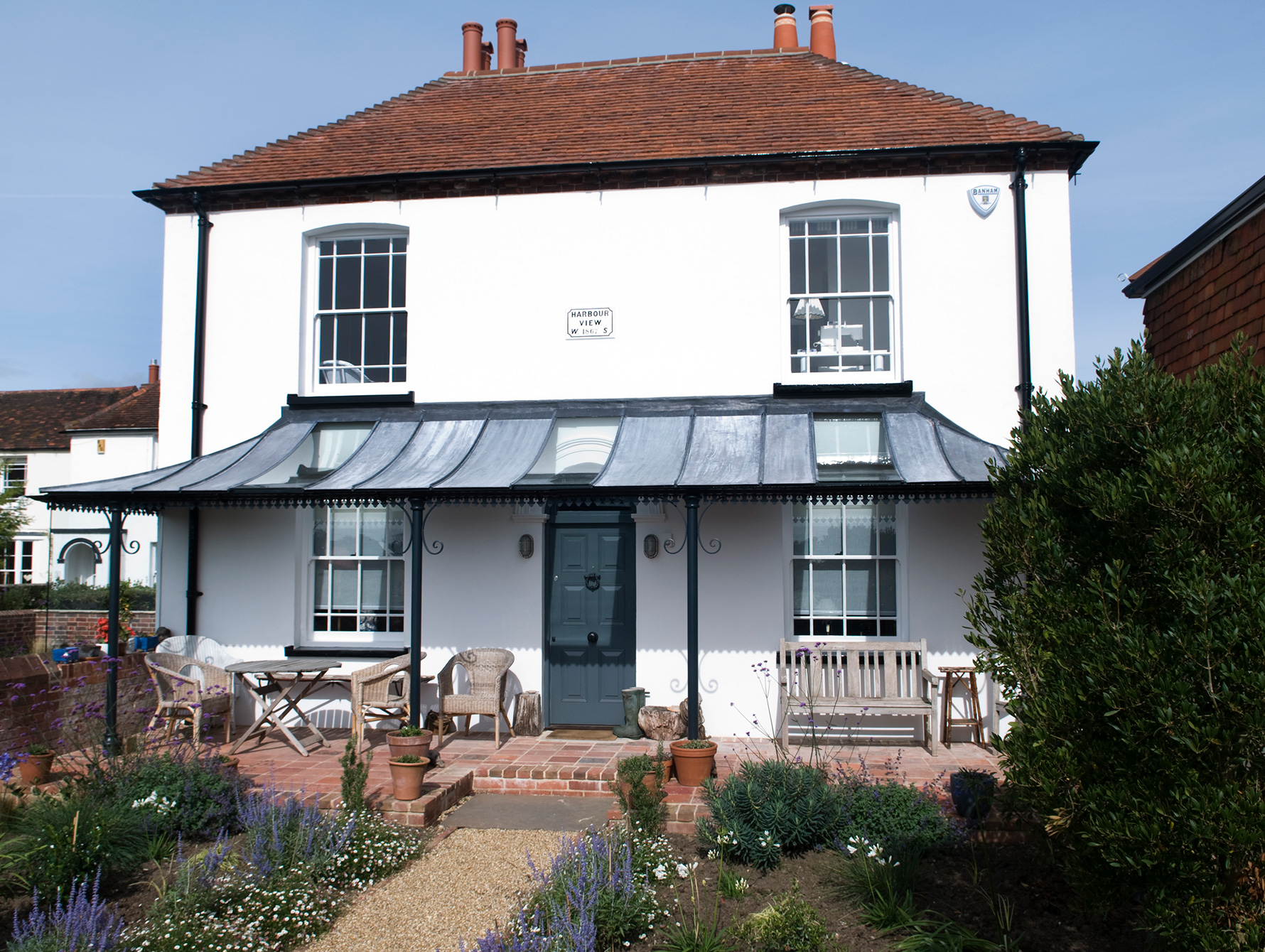 A curved and hipped glazing bar roof that has been partially glazed